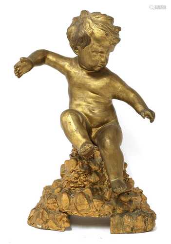 A carved giltwood figure of a putto,