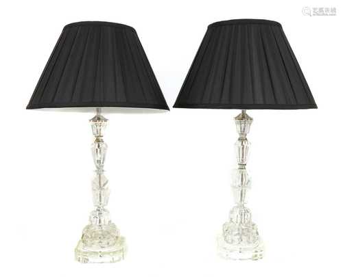 A pair of moulded glass column table lamps,