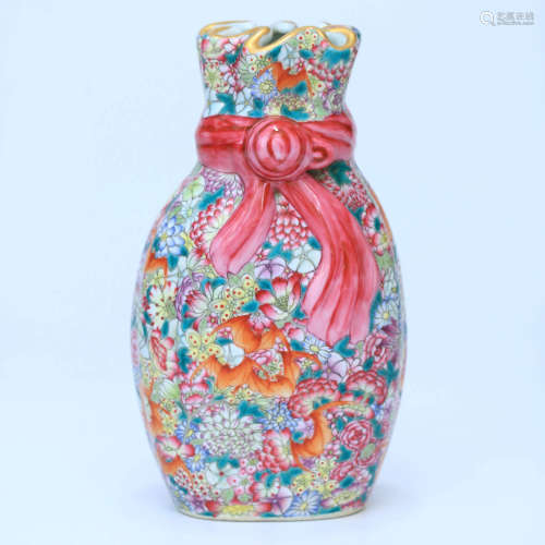A Famille Rose Floral Carved Porcelain Vase