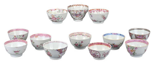 TWELVE CHINESE FAMILLE ROSE PORCELAIN TEACUPS, 18th CENTURY