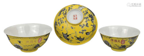 THREE CHINESE YELLOW GROUND GRISAILLE DECORATED BOWLS, LATE ...