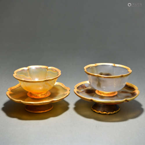 A Pair of Agate Cups and Saucers with Gold and Sliver Lips