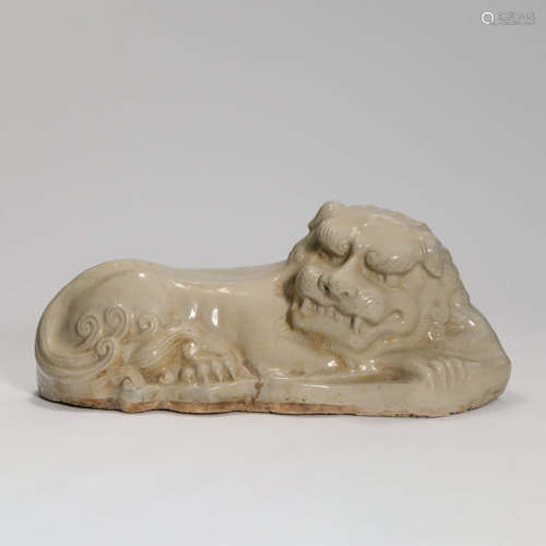 A Celadon-glazed Porcelain Lion Ornament