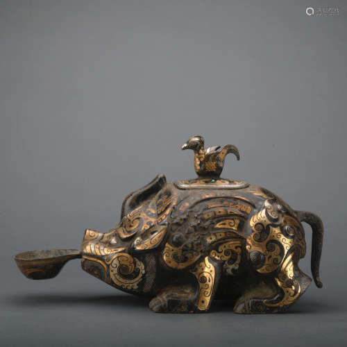 A bronze pig incense burner ware with gold and silver