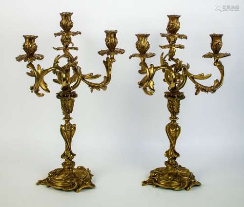 Pair of firegilt bronze candlesticks