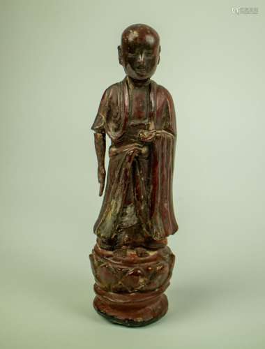 Wooden sculpture of a monk Thai