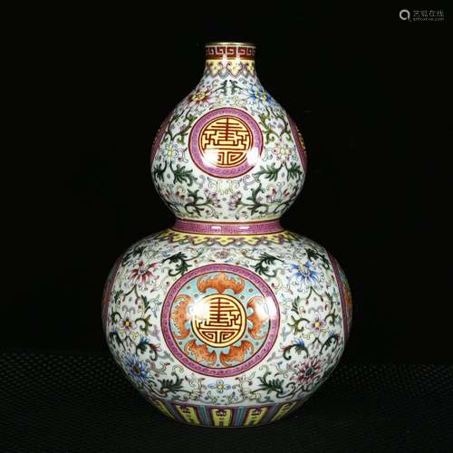 Qing Qianlong enamel painted gold Fushou Yannian grain bottl...