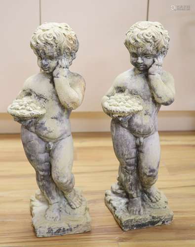 Two reconstituted stone garden cherubs, height 70cm