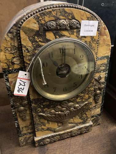 A Bulle black and ochre marble cased electric mantel clock, ...