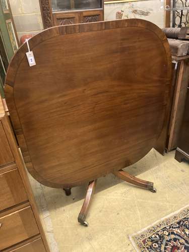 A George IV rosewood banded mahogany tilt top breakfast tabl...