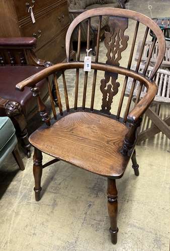 A 19th century yew and elm Windsor elbow chair, width 53cm, ...