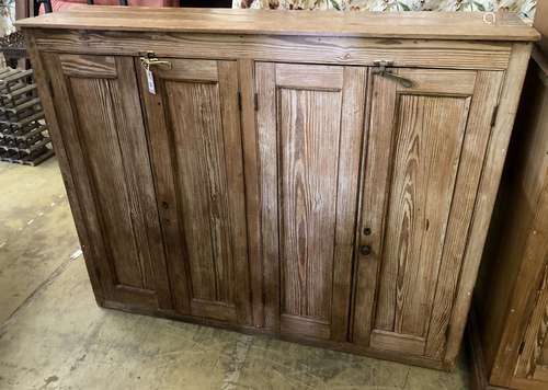 A Victorian pitch pine four door cabinet, width 146cm, depth...