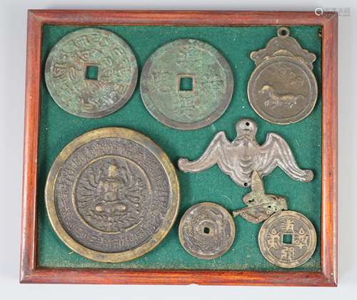 A group of Sino-Sanskrit bronze amulets/charms, 19th century...