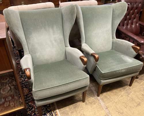 A pair of Parker Knoll Model 757 wing armchairs, width 79cm,...