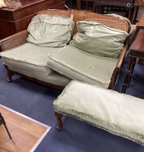 A 1920's mahogany framed three piece Bergere suite, together...