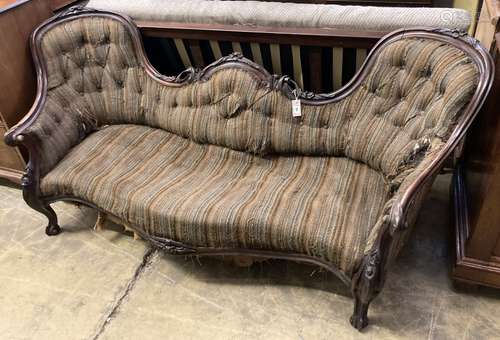 A Victorian carved walnut double spoon back settee, length 2...