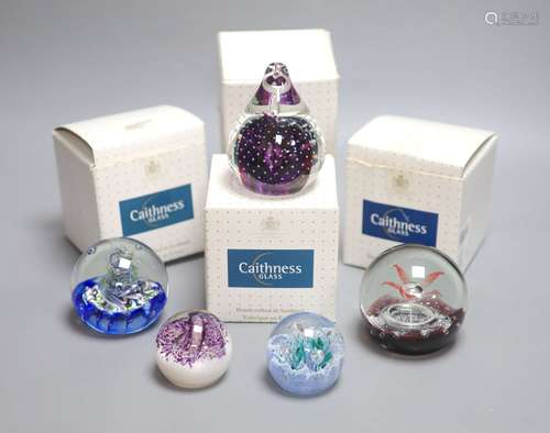 A collection of Caithness and other paperweights