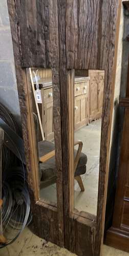 A pair of rectangular reclaimed driftwood wall mirrors, widt...