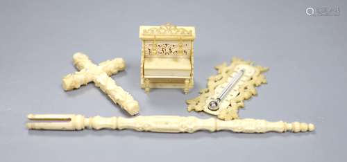 A group of decorative ivory and bone objects to include a 19...