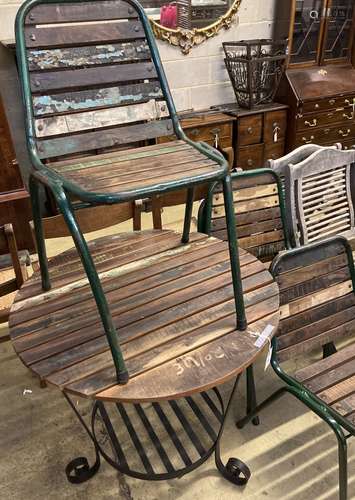 A circular slatted wood and wrought iron garden table, 85cm ...