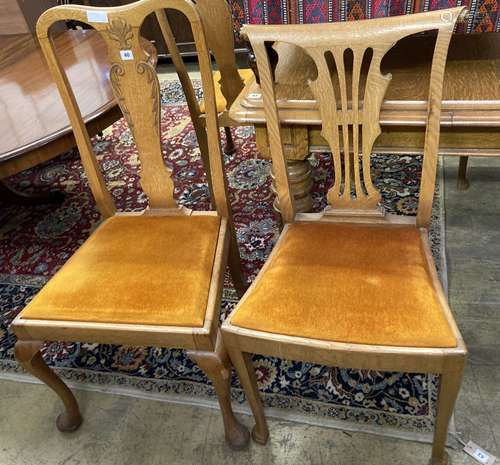 A set of six early 20th century oak dining chairs together w...