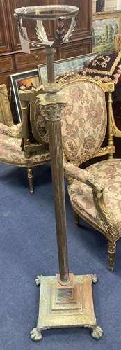 An Edwardian Corinthian column brass adjustable oil standard...