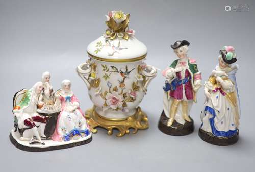 A Dresden porringer and three Continental porcelain figure g...