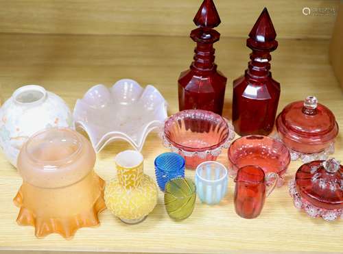 A pair of Victorian ruby glass decanters, cranberry and mixe...