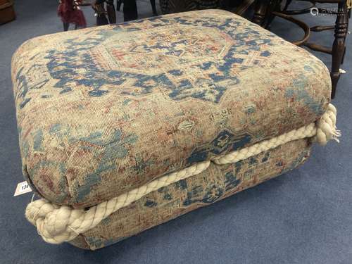 A rectangular Persian rug footstool, length 76cm, depth 60cm...