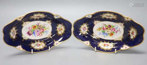 A pair of Royal Worcester blue ground floral painted dishes ...