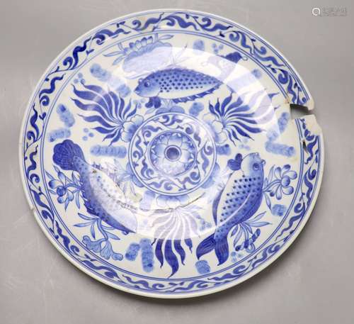 A Chinese blue and white 'fish' dish, diameter 36cm (a.f.)