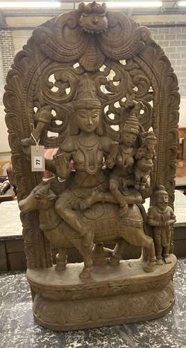 An Indian carved wood deity, width 50cm, depth 15cm, height ...