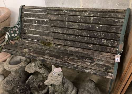 A Victorian style cast metal slatted garden bench, length 12...