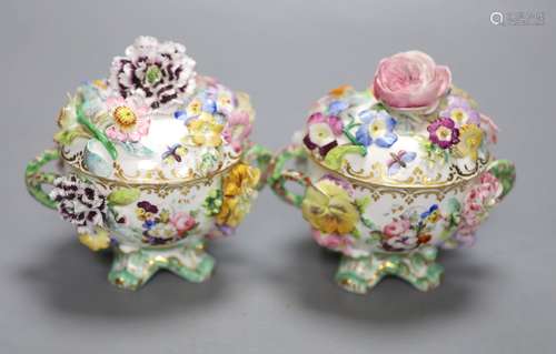 A mid 19th century Coalport pair of floral encrusted two han...