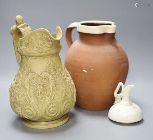 An ornate 19th century jug, another and a cream glazed Worce...