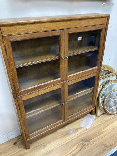 A Minty style glazed oak two section bookcase, width 87cm de...