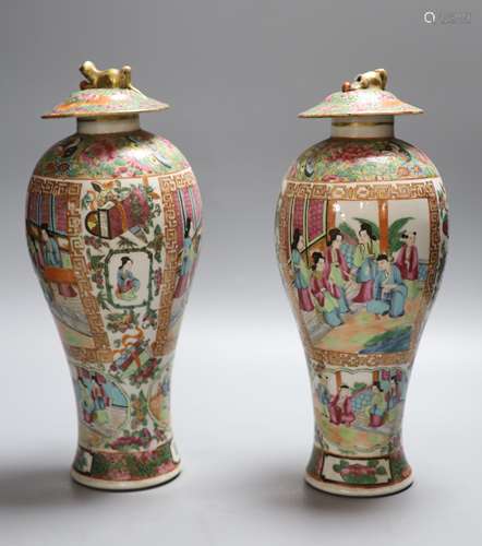 A pair of 19th century Chinese famille rose vases and associ...