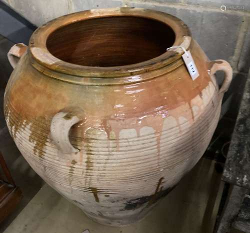 A large glazed earthenware garden urn, 86cm diameter, height...