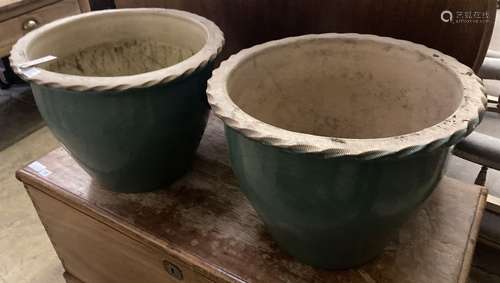 A pair of circular glazed earthenware garden planters, 48cm ...