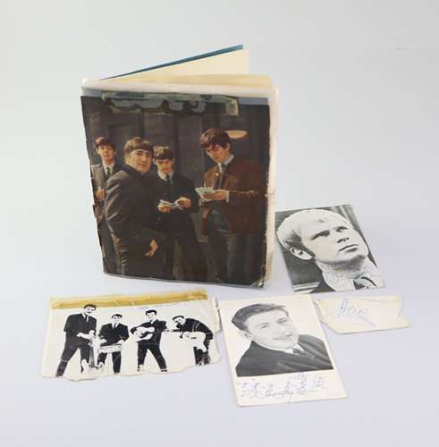 A 1960s album of rock musicians autographs including two set...