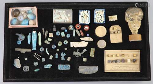 A group of Egyptian stone and turquoise glazed faience amule...