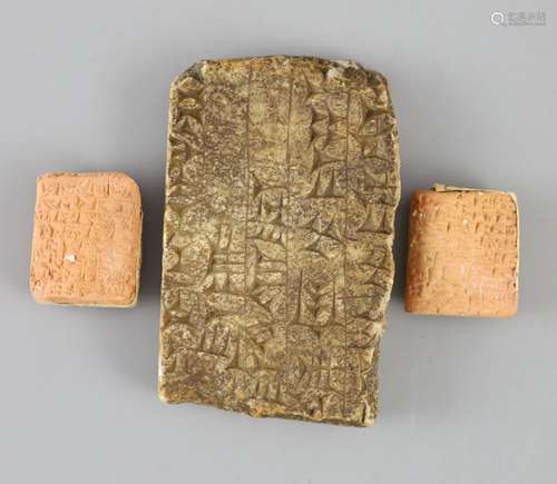 An Ancient Assyrian fragment of a cuneiform alabaster slab, ...