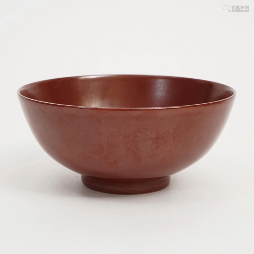 A RED-GLAZED BOWL