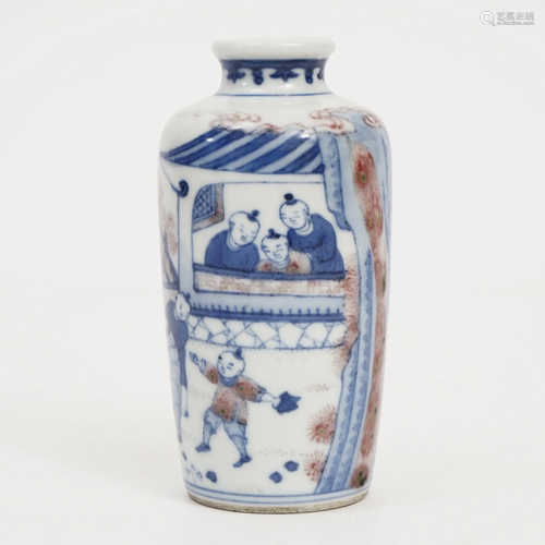 A BLUE AND WHITE GLAZED RED SNUFF BOTTLE