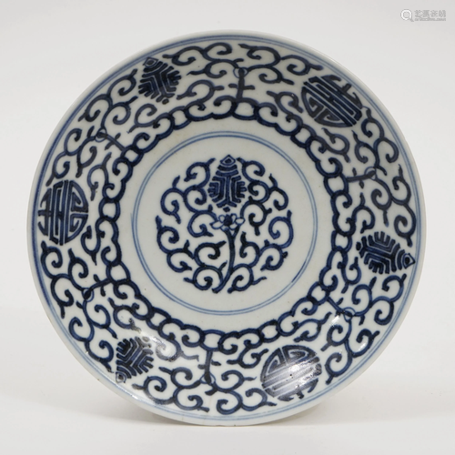 A BLUE AND WHITE PLATE