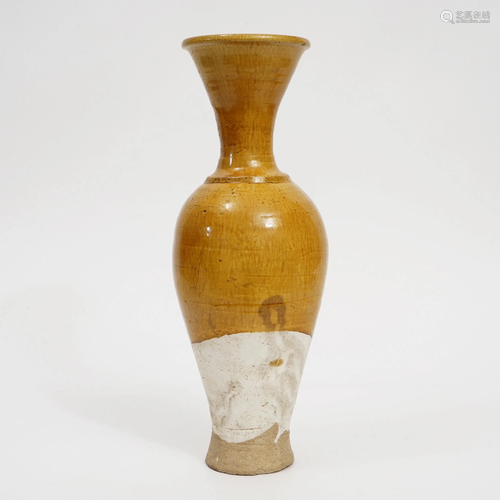 A YELLOW-GLAZED VASE