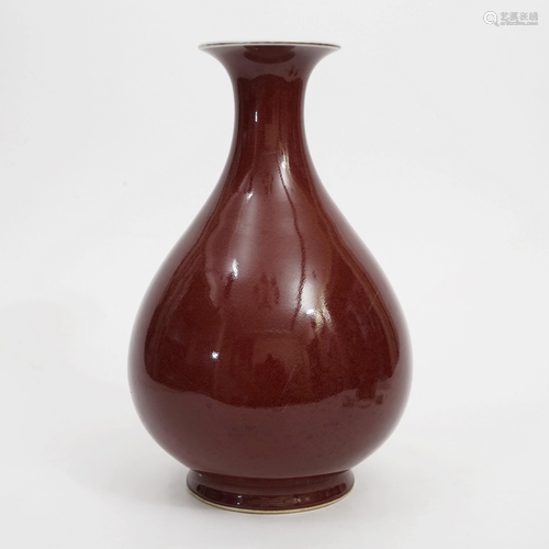 A RED-GLAZED VASE