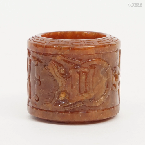 A RED JADE RING,