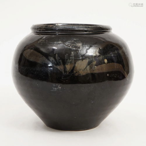 A BLACK-GLAZED BROWN POT FROM CIZHOU KILN