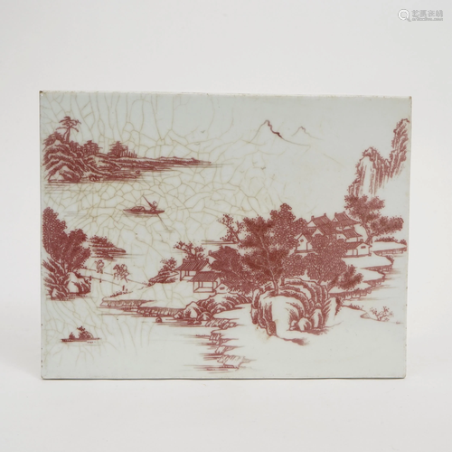 A PORCELAIN PLATE WITH RED UNDERGLAZED LANDSCAPE